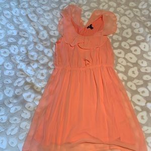 Super soft and pretty coral sleeveless dress.